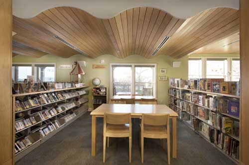 Thomas Memorial Library interior view, Capital Campaign, displaying book shelves and tables